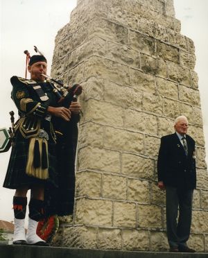Piper John Campbell and Fairlie RSA President Mick Carlton at the Mackenzie War Memorial, ca 2019